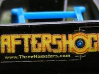 ThreeHamsters.com on the back of Mattel's Hot Wheels AfterShock